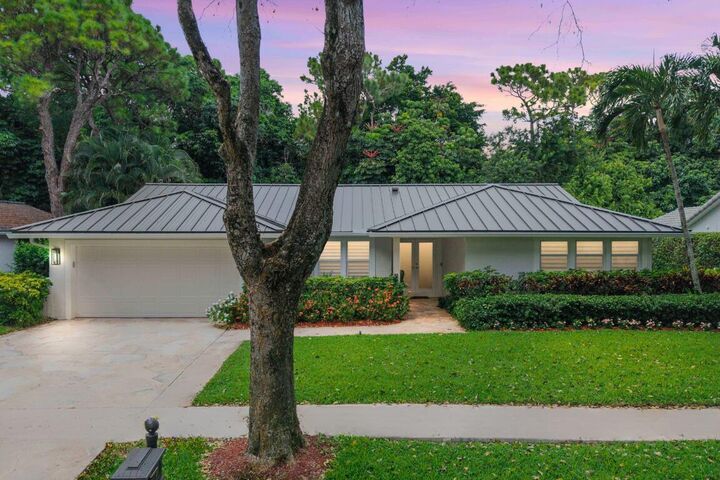 Property Photo:  2421 NW 36th Street  FL 33431 