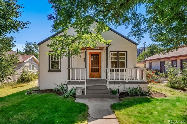 Property Photo:  3388 S Washington Street  CO 80113 