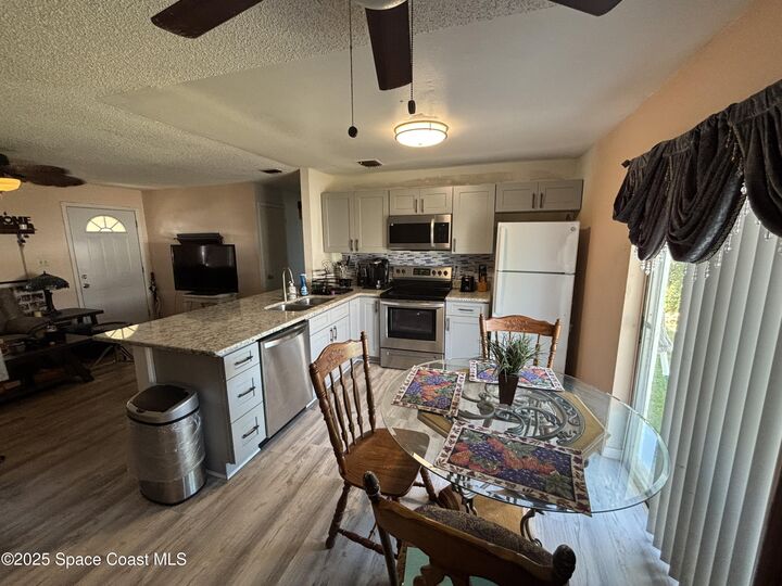 Property Photo:  50 N Lee Court  FL 32952 