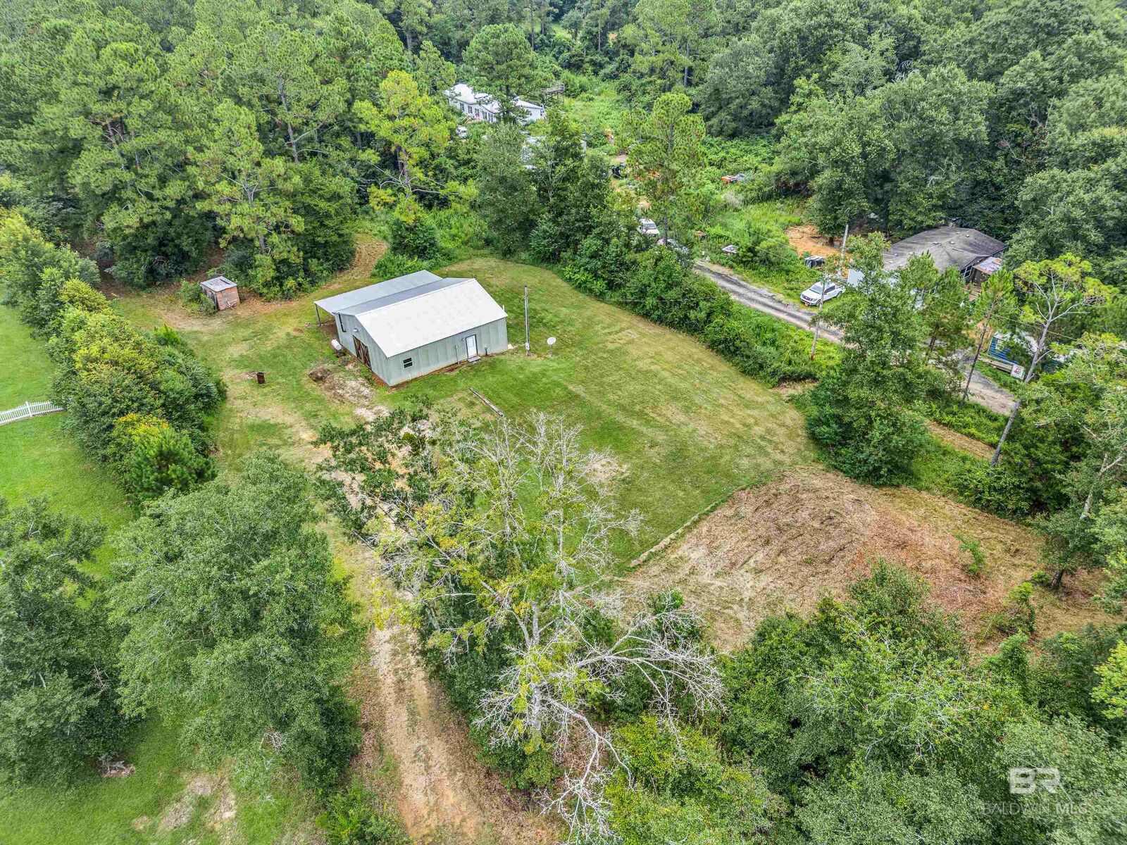 Property Photo:  22131 County Road 64  AL 36567 