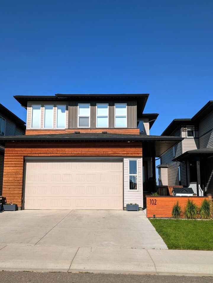 Property Photo: 102 Blackwolf Bay N AB T1H 7E9