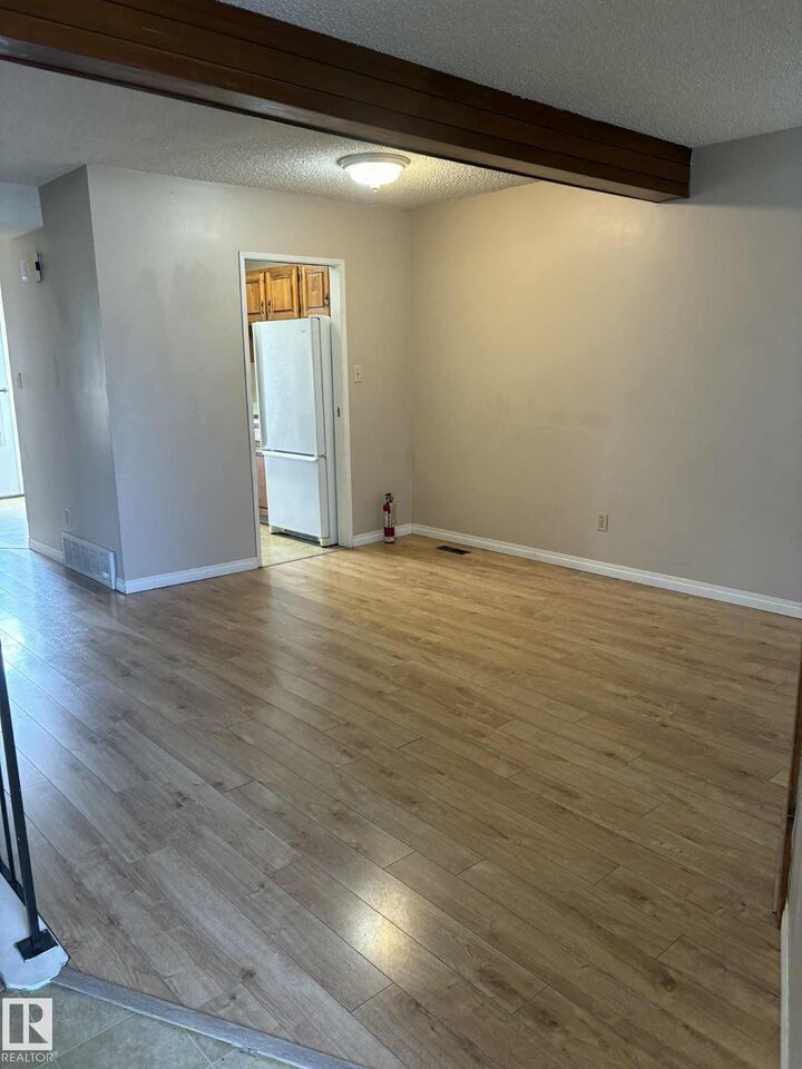 Property Photo:  10405 24 Avenue NW  AB T6J 4S2 