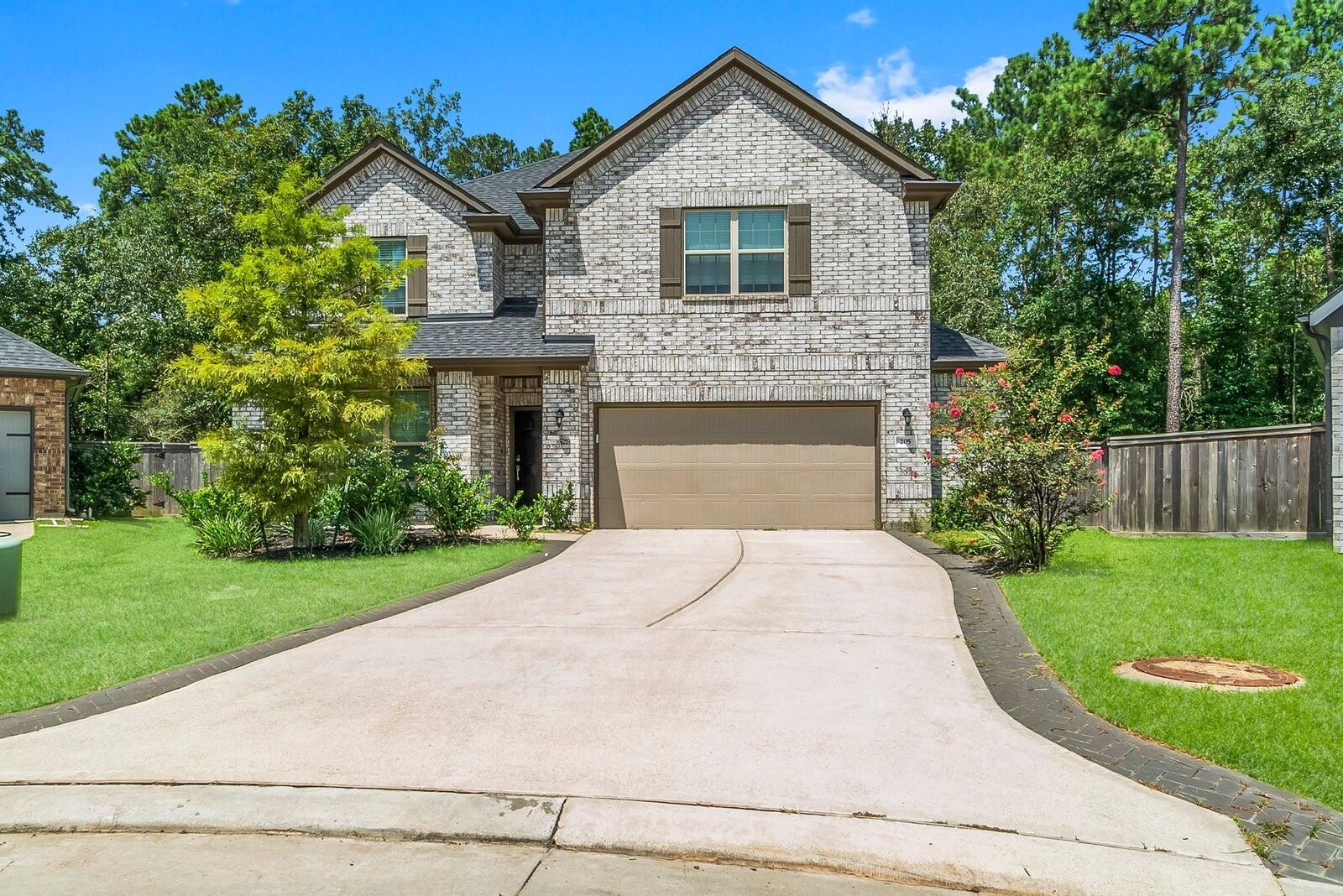 Property Photo:  205 Rose Gum Court  TX 77318 