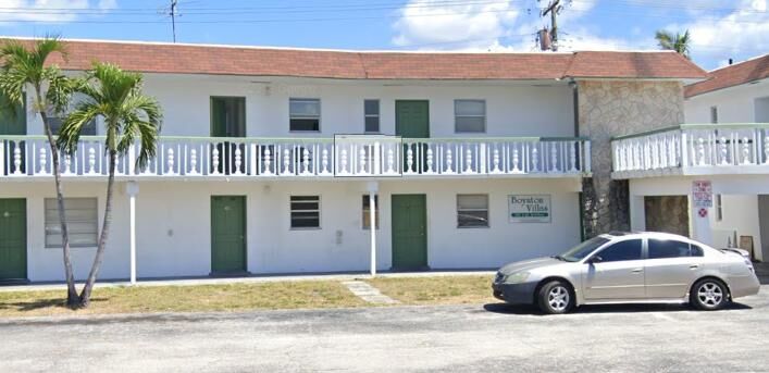 Property Photo:  135 SW 3rd Avenue 47  FL 33435 