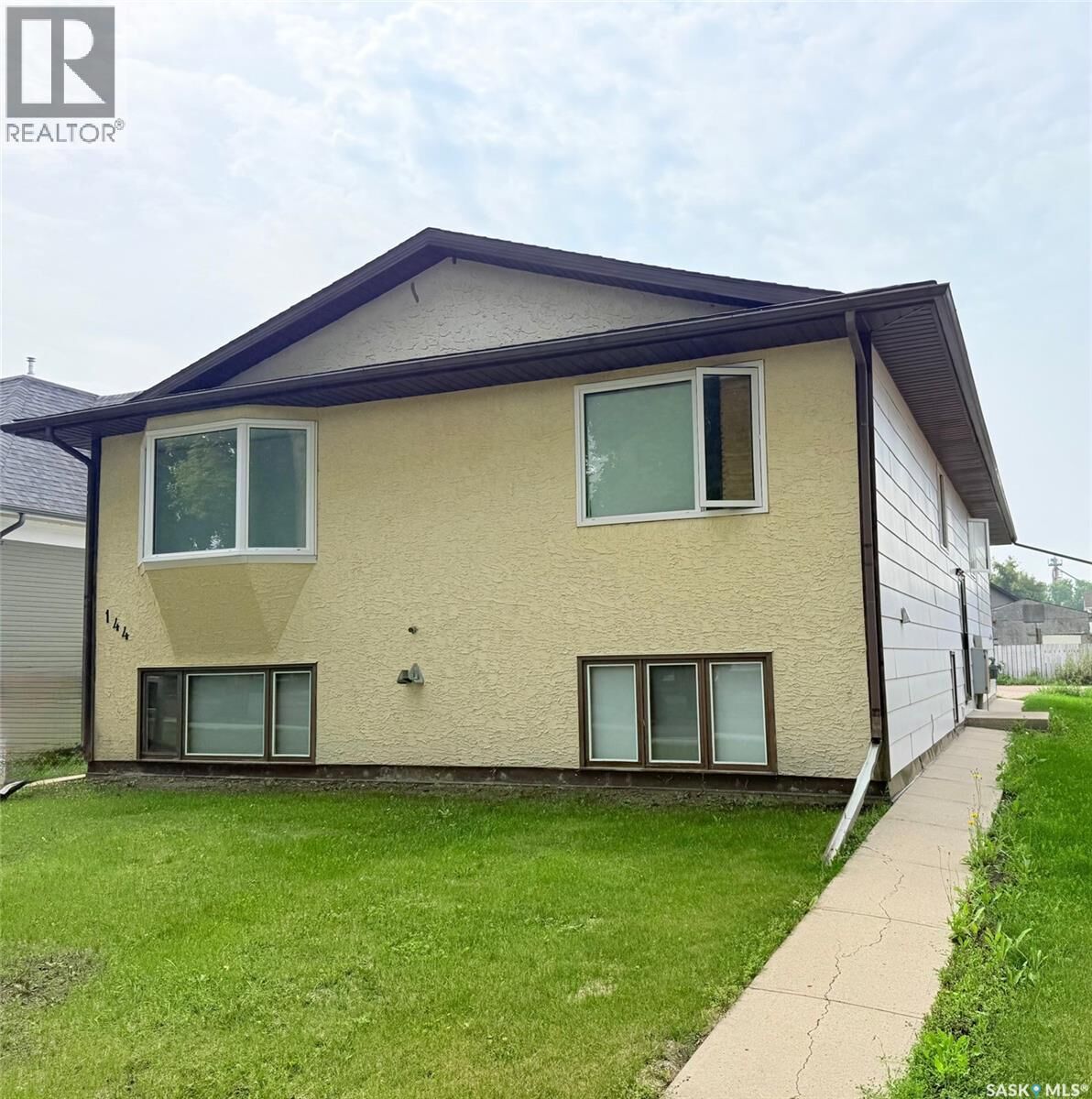 Property Photo:  144 First Avenue N  SK S3N 1J8 