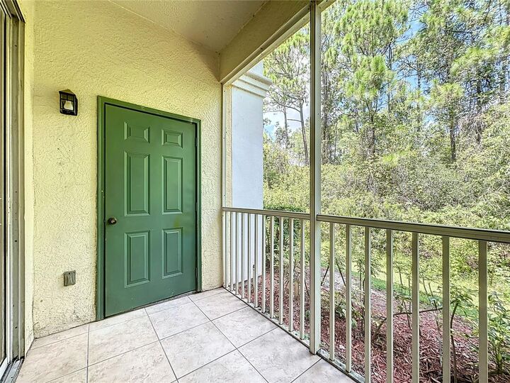 Property Photo:  8919 Legacy Ct 104  FL 34747 