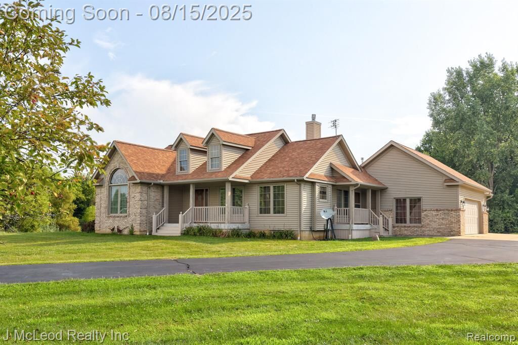 Property Photo:  9019 Cardinal Drive  MI 48746 