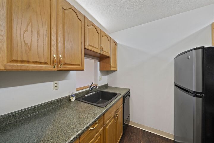 Property Photo: 133 Commander Shea Blvd 215 MA 02171