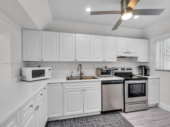 Property Photo:  7023 NW 169th St 7023  FL 33015 