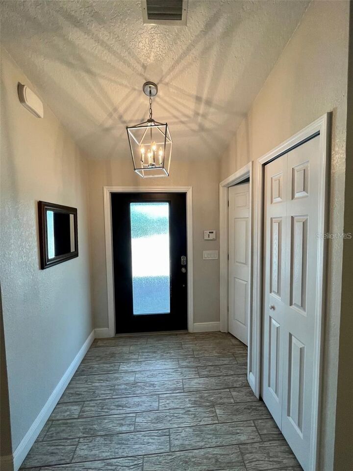 Property Photo:  704 Osmosis Drive SW  FL 32908 