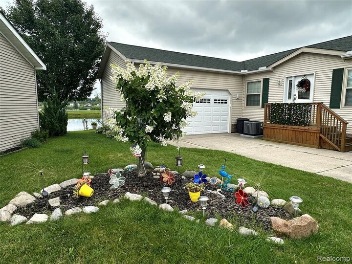 Property Photo:  148 Pine Lakes Drive  MI 48446 4502 