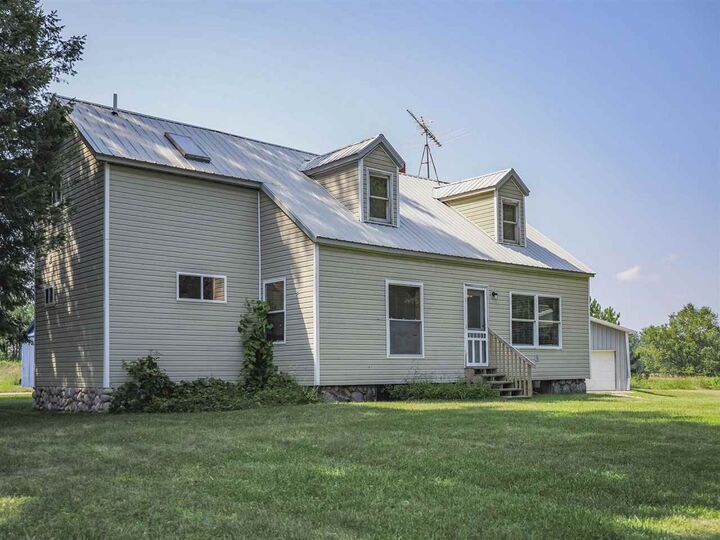Property Photo:  635 N Advance  MI 49712 