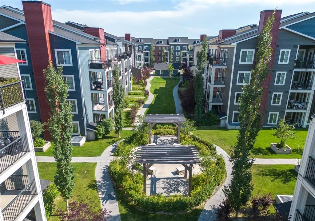 Property Photo: 755 Copperpond Boulevard SE 1311 AB T2Z 4R2