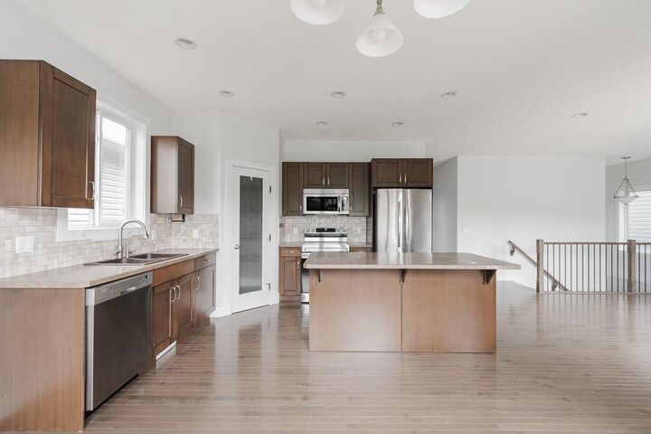 Property Photo:  112 Killdeer Way  AB T9K 0P8 