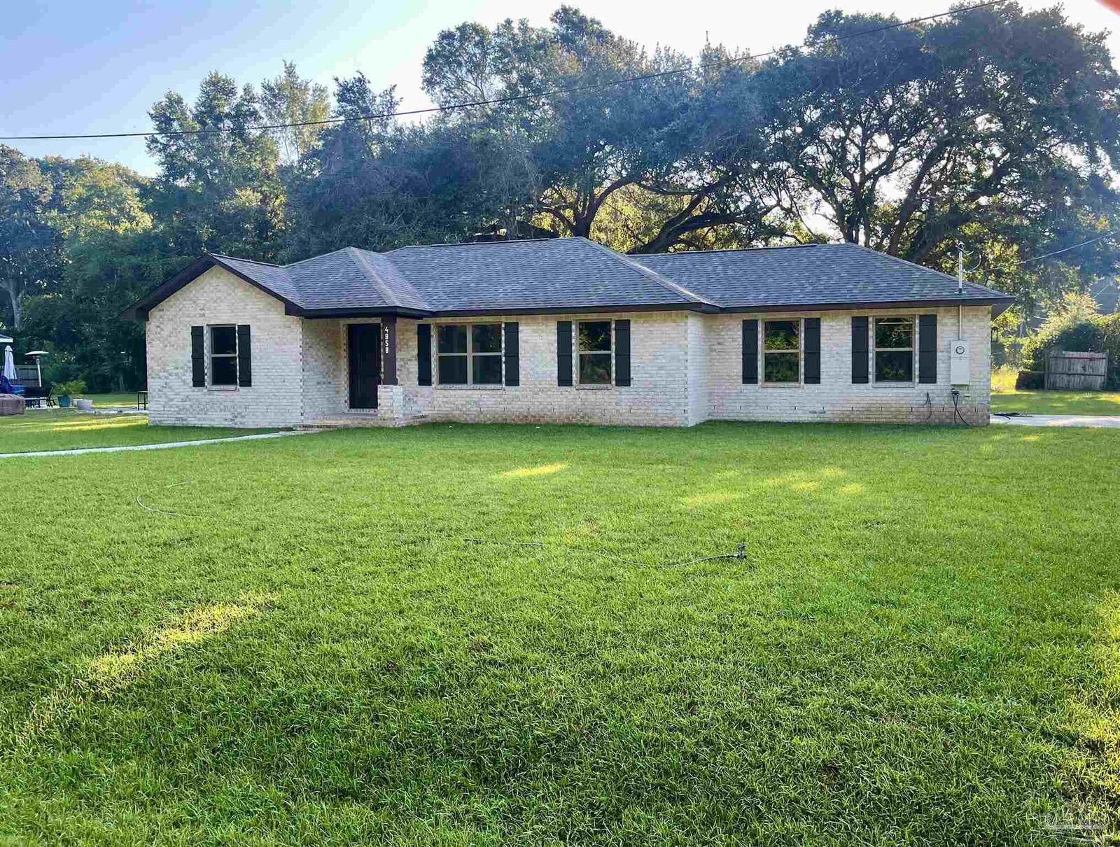 Property Photo:  4858 Lamar Dr  FL 32571 