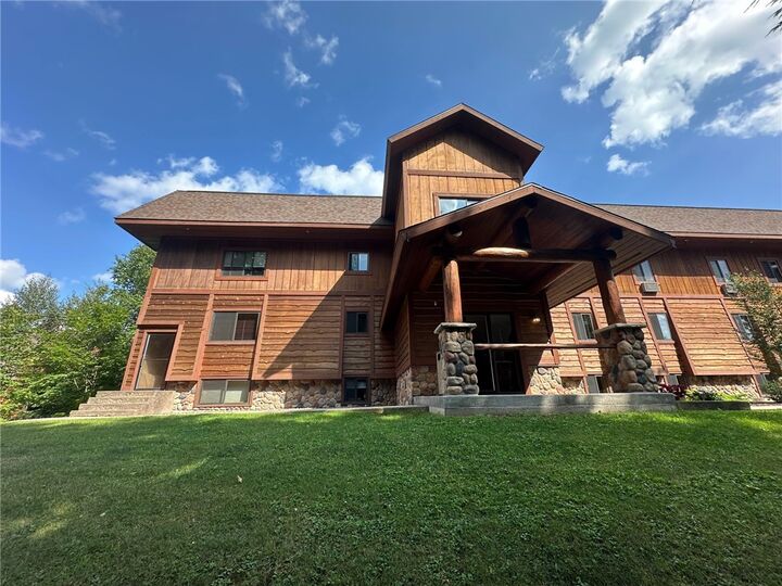 Property Photo:  42910 Lakewoods Drive 303  WI 54821 