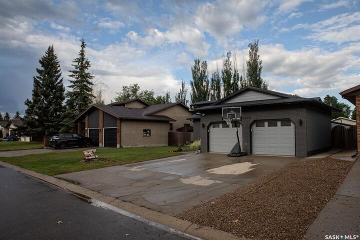 Property Photo: 11219 Gardiner Drive SK S9A 3M5