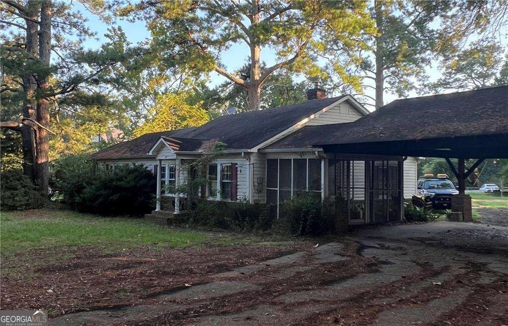Property Photo:  83 Woodstock Road  GA 30075 