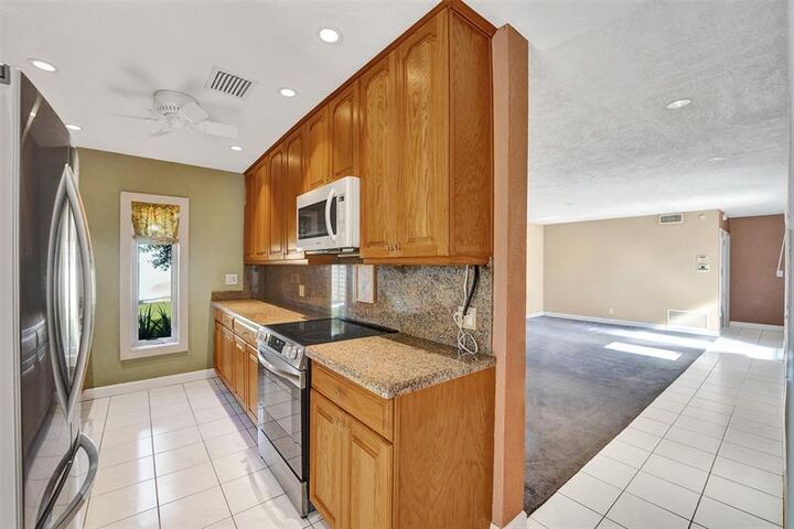 Property Photo:  5562 SW 1st Ct  FL 33317 