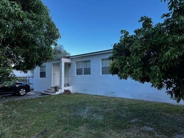 Property Photo:  1125 NW 144th Street 1  FL 33168 