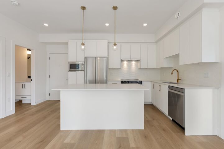 Property Photo:  20286 72B Avenue 411  BC V2Y 1T9 