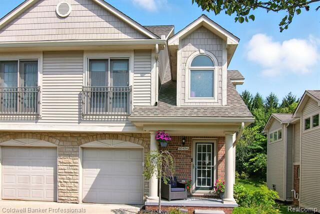 Property Photo:  50454 Beechwood Court 36  MI 48170 