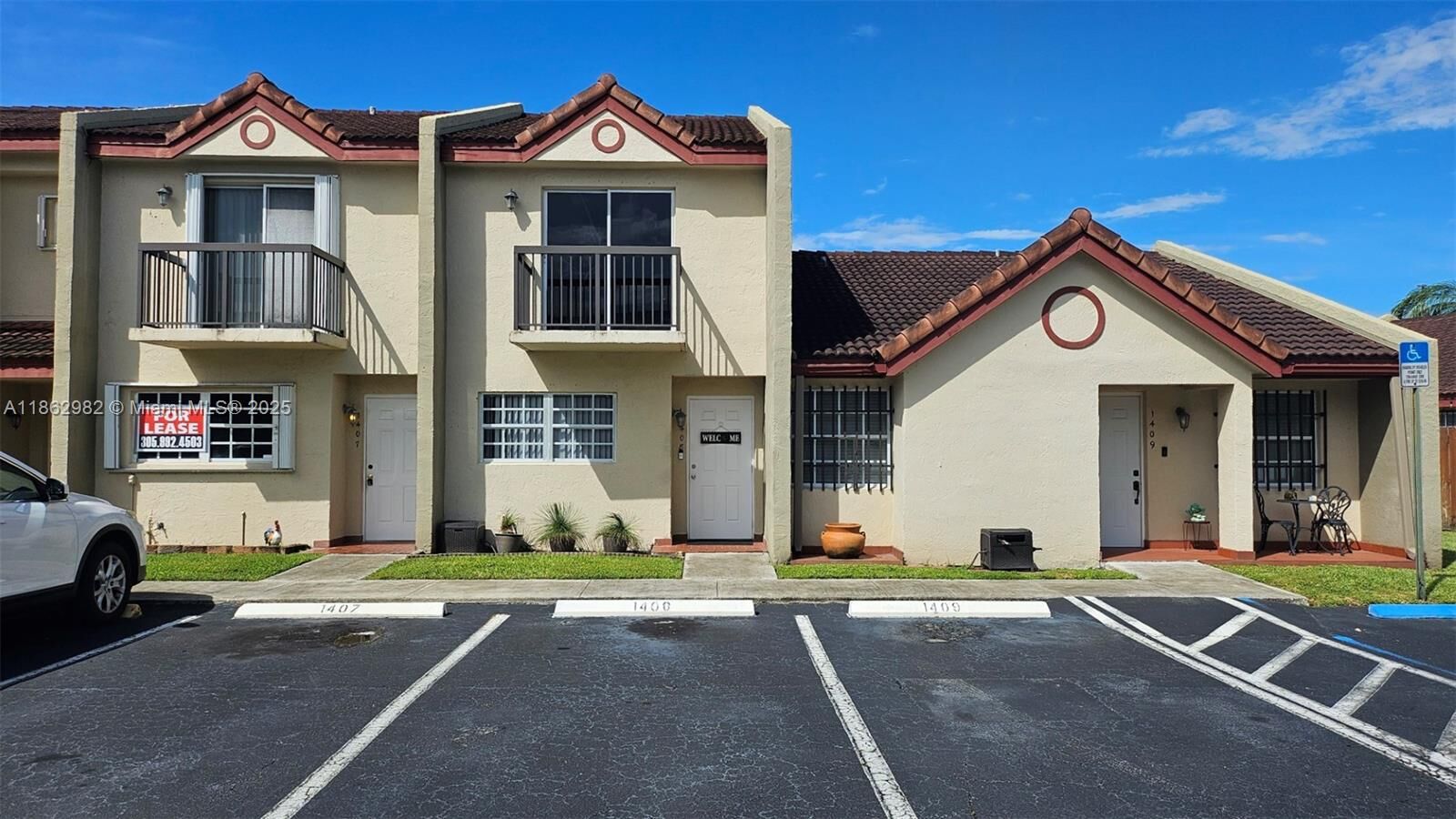 Property Photo:  6155 SW 130th Ave 1407  FL 33183