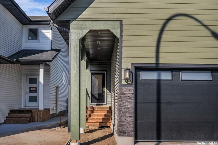 Property Photo: 307 Sharma Crescent SK S7W 1J1