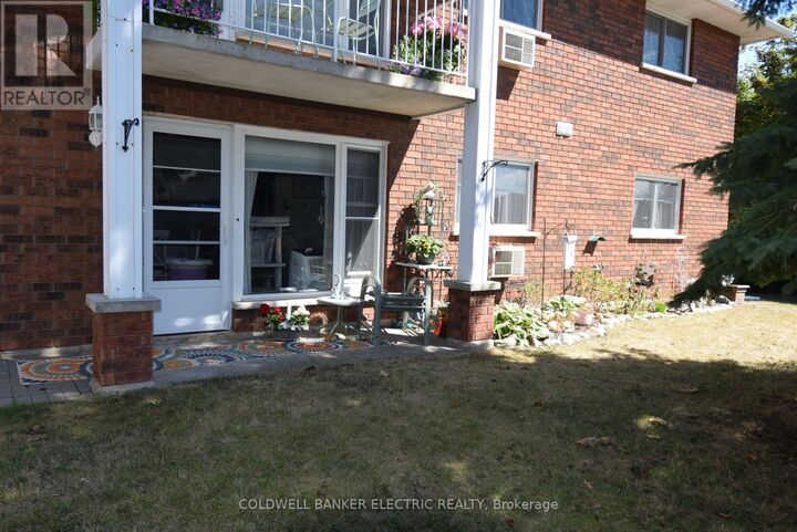 Property Photo: 2418 Mountland Drive 104 ON K9K 2E2