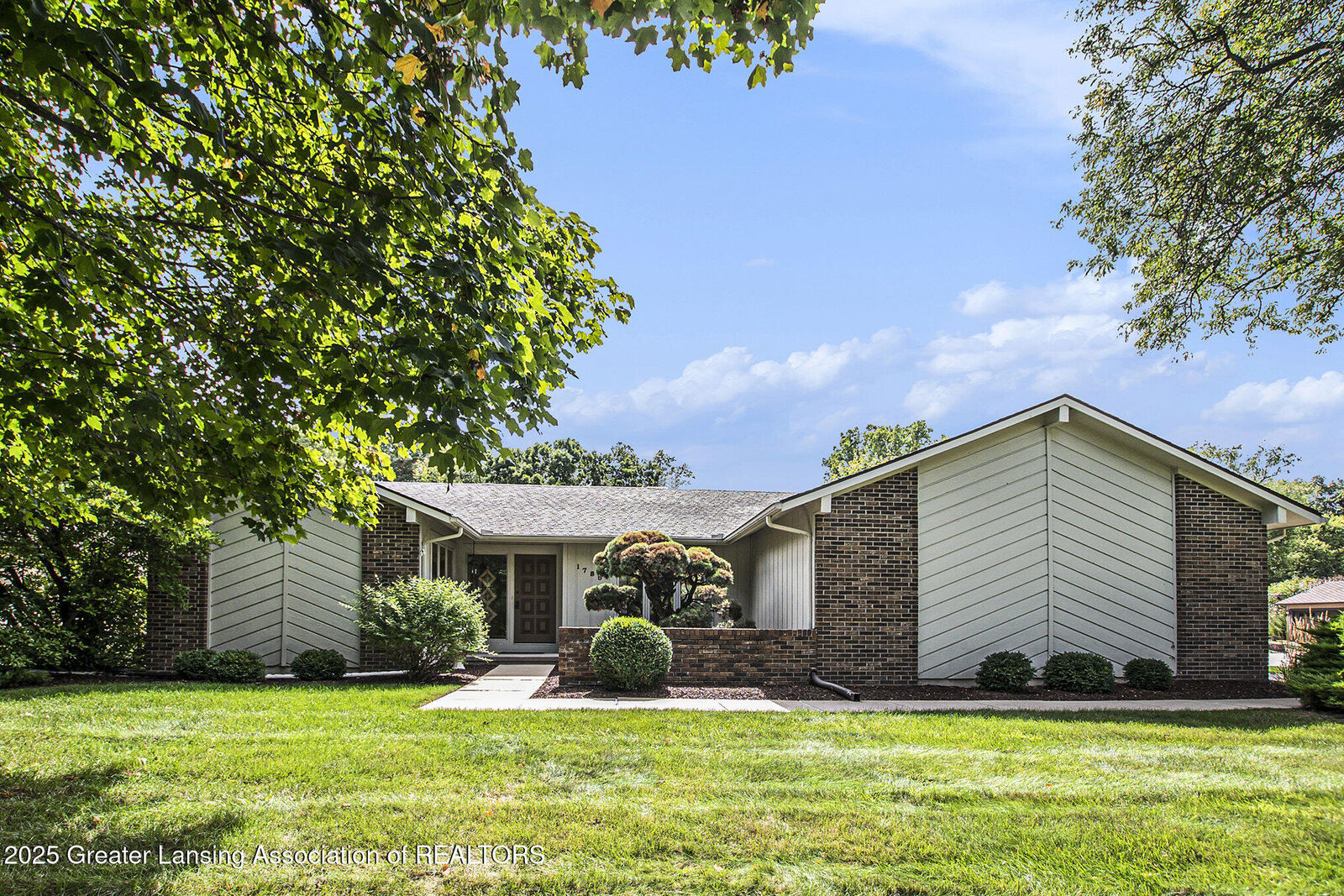 Property Photo: 1785 Mirabeau Drive MI 48864
