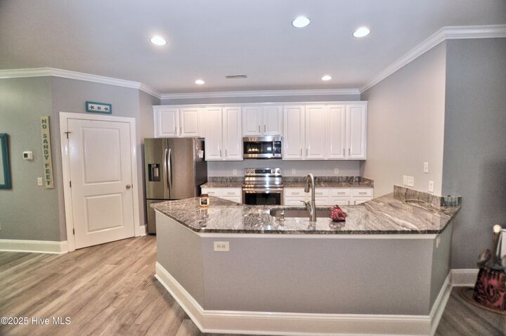 Property Photo:  7195 Bonaventure Street SW 403  NC 28469 