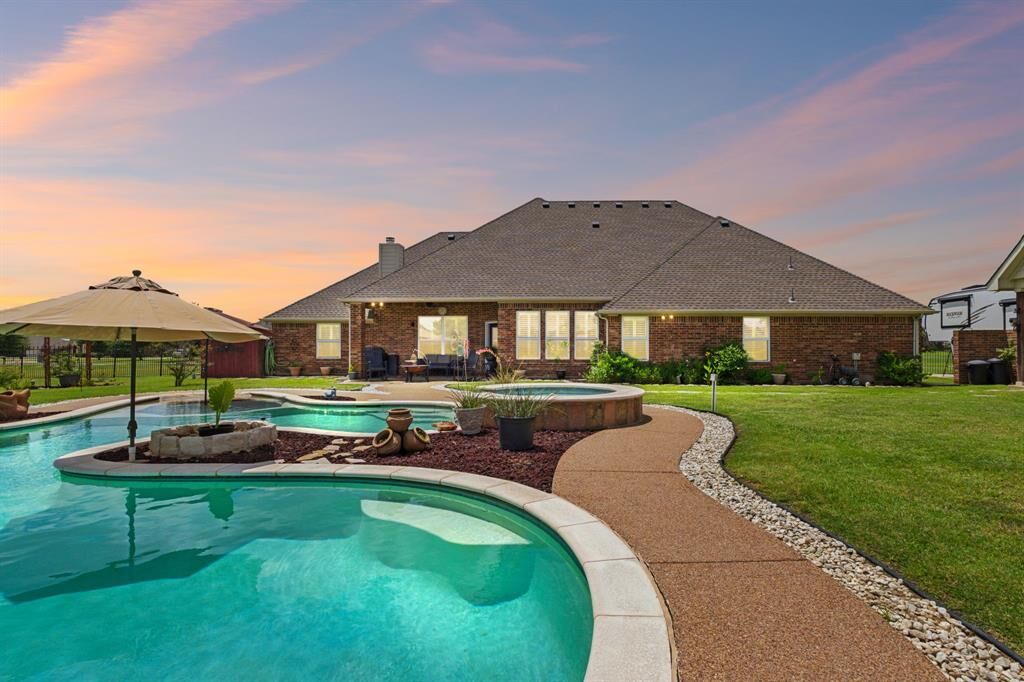 Property Photo: 11208 Brook Green Lane TX 76052