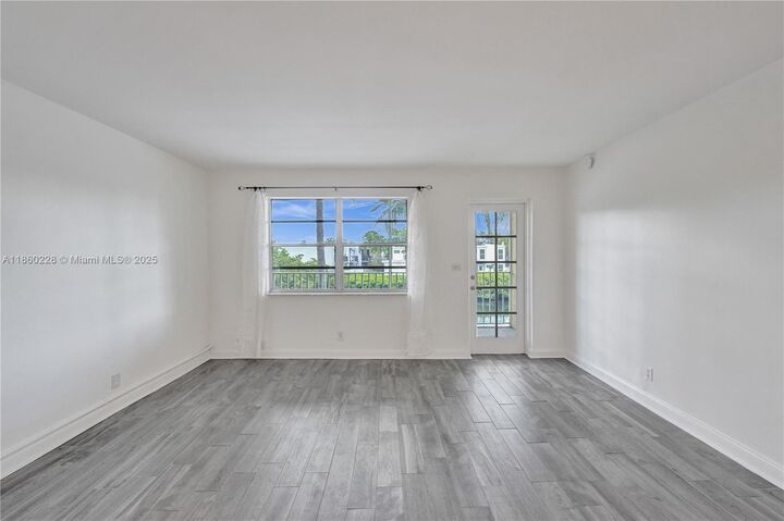 Property Photo: 801 NE 18th Ct 209 FL 33305