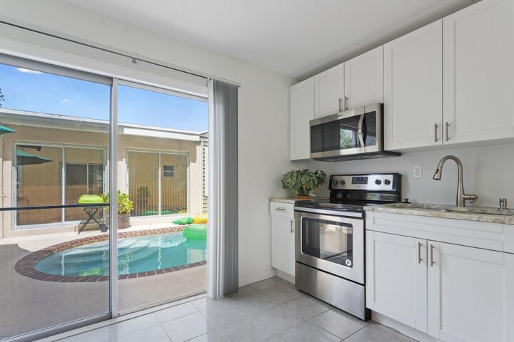 Property Photo: 216 S Ocean Breeze #1 Poolside FL 33460