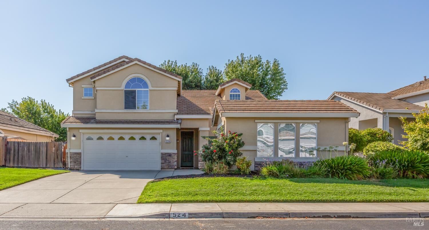 Property Photo: 524 Feather River Way CA 95688