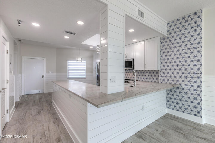 Property Photo: 104 Surfview Drive 2106 FL 32137