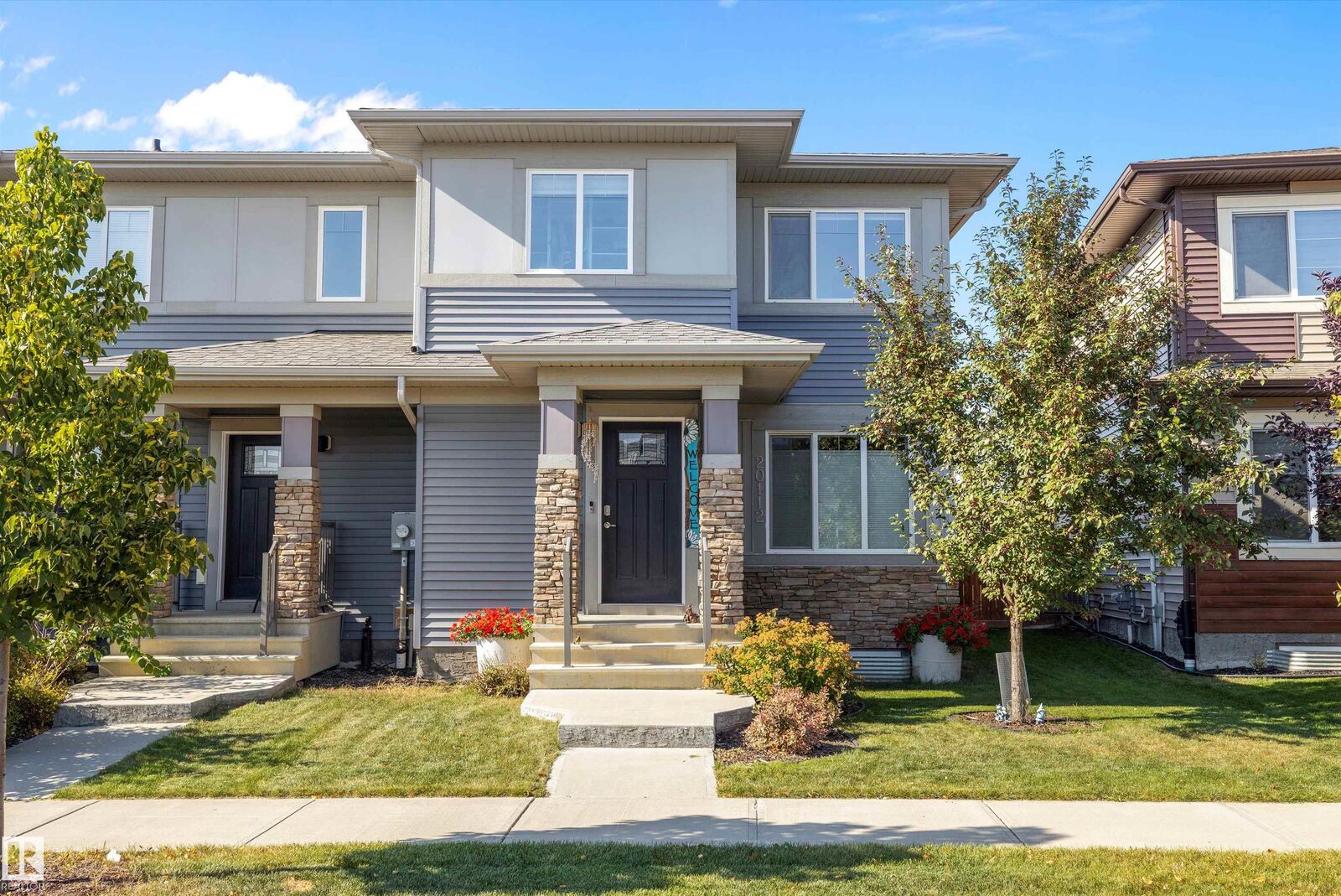 Property Photo: 20112 27 Avenue NW AB T6M 0W7