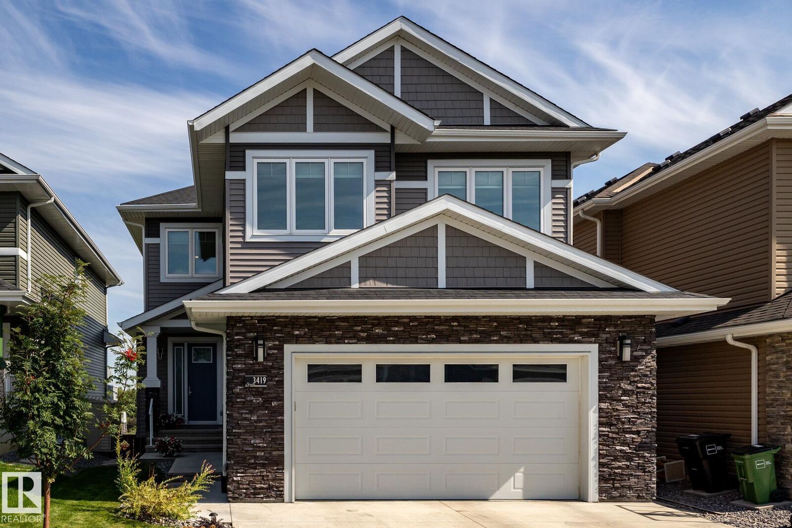 Property Photo: 3419 Chickadee Dr NW AB T5S 0L1