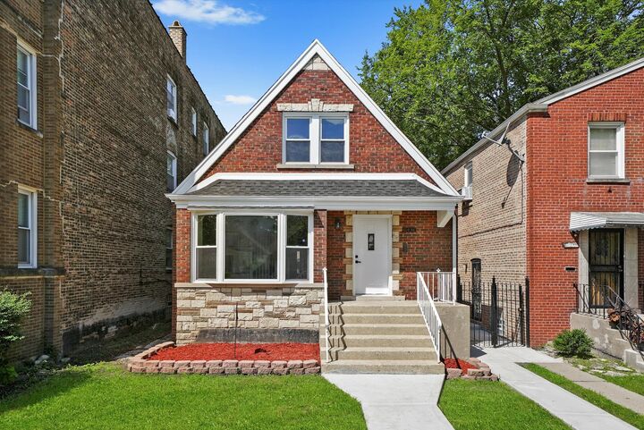 10436 S Eberhart Avenue  Chicago IL 60628 photo
