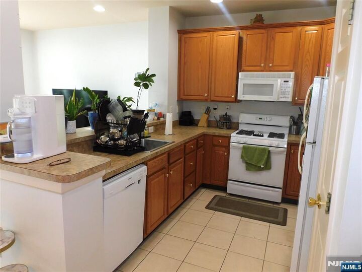 Property Photo:  108 Riverwalk Way D027  NJ 07014 