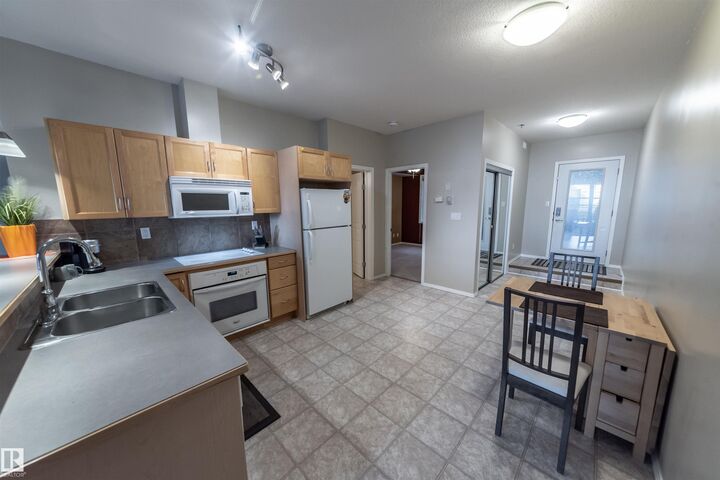 Property Photo: 4827 104A Street NW 150 AB T6H 0R5