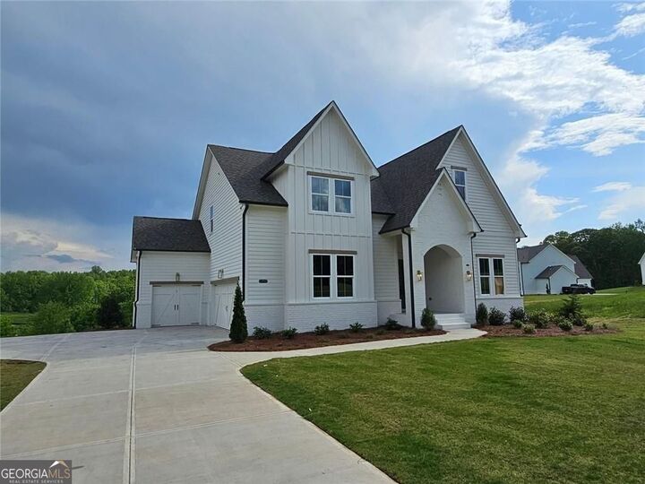 Property Photo:  6490 Mockingbird Road  GA 30028 