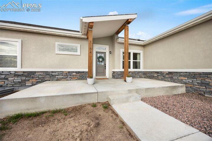 Property Photo: 7154 Marshbern Court CO 80908