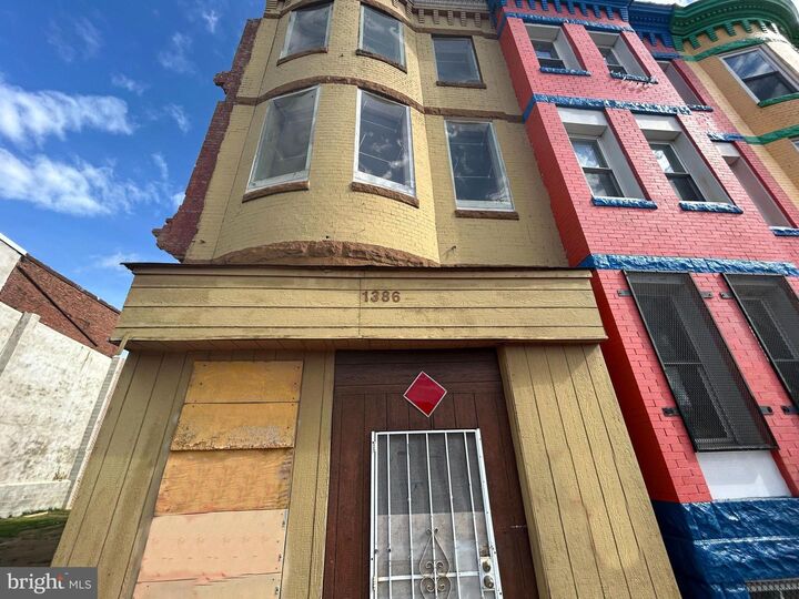 Property Photo:  1386 W North Avenue  MD 21217 