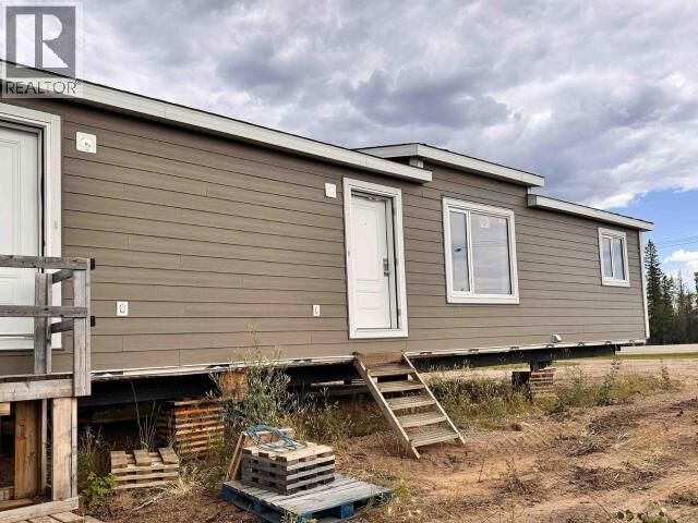 Property Photo:  3 Duplexes Req Relocation  NT  