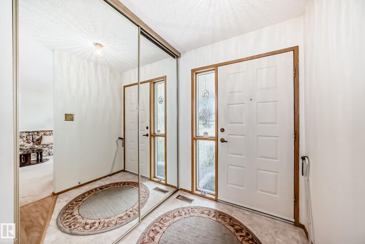 Property Photo:  10652 153 Avenue NW  AB T5X 5R8 