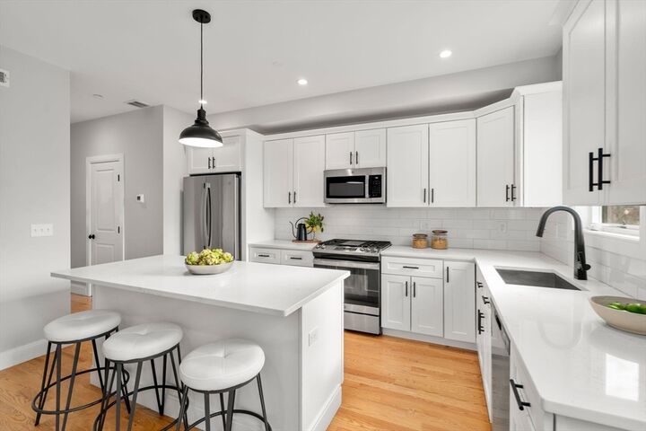 Property Photo:  123-125 Centre St Th6  MA 02124 
