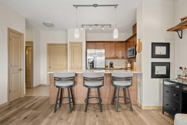 Property Photo:  310 McKenzie Towne Gate SE 1403  AB T2Z 1A6 