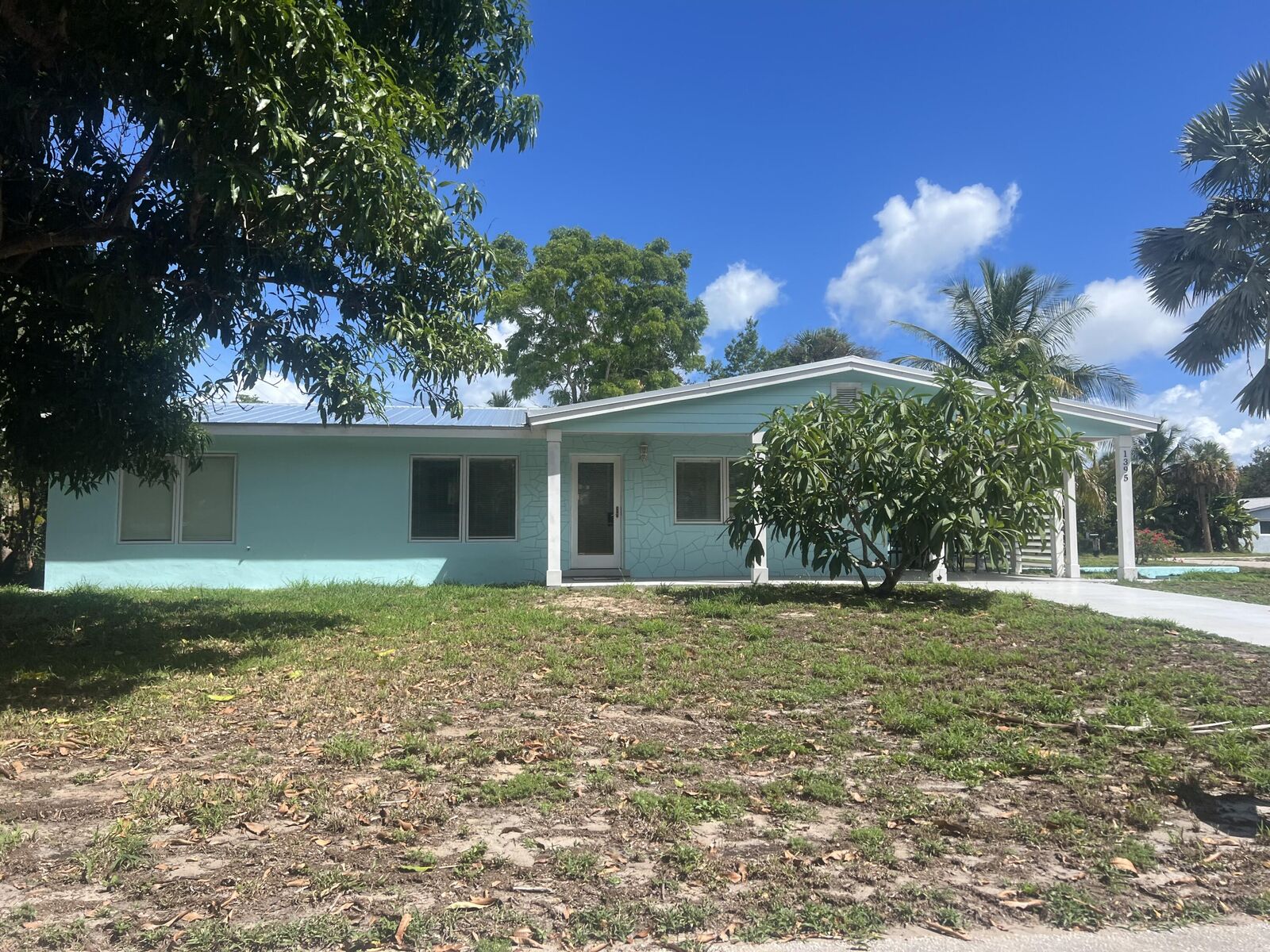 Property Photo: 1395 NE Flora Place FL 34957