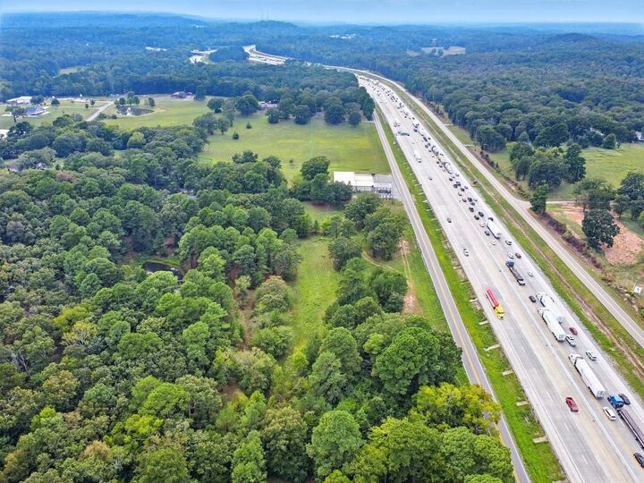 Property Photo:  6 Acres S. Beggs And I-30 Service Road  AR 72015 